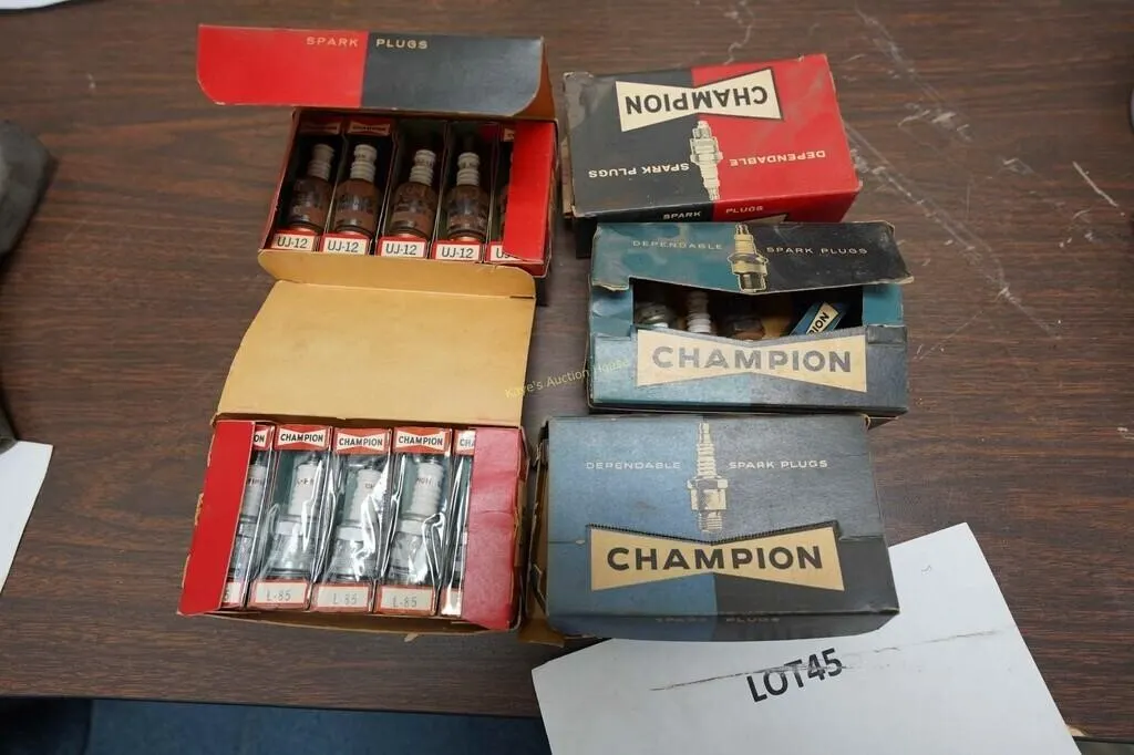 assorted vintage Champion spark plugs