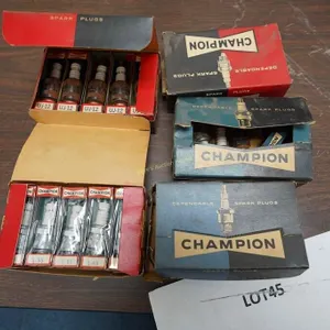 assorted vintage Champion spark plugs