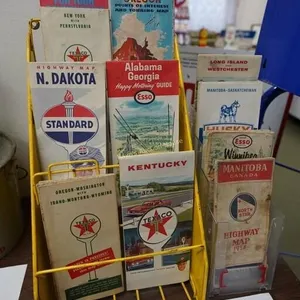 assortment of vintage gas station city maps