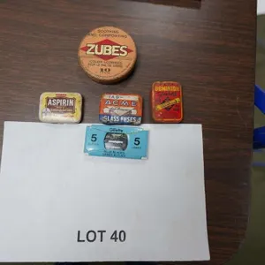 assorted vintage advertising tins