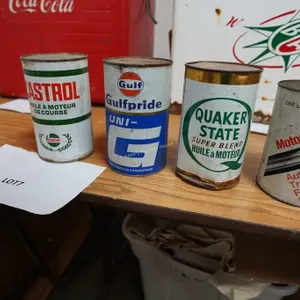 4-vintage automotive oil and fluid cans