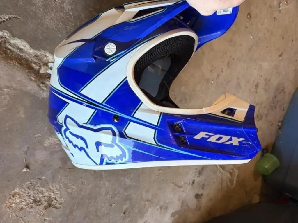 FOX and other racing helmets