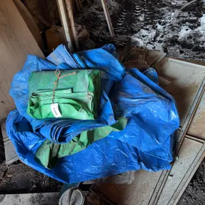 Blue and Green Tarps with Boards