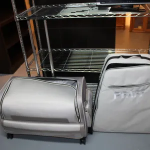Pfaff Rolling Suitcase & Pfaff Bag