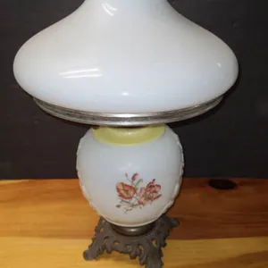 White Glass Table Lamp With Floral Design and Metal Base