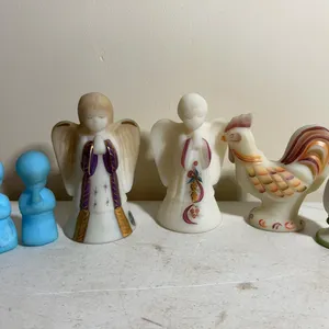 (2) Fenton hand painted angels, hand painted rooster, (2) praying figurines & Christmas stand