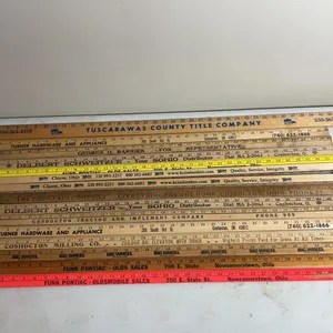 (15) yard sticks including tuscarawas county title company, Keim Lumber, Big Wheel & more