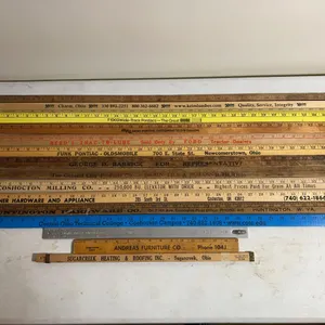 (12) yard sticks including Keim, Coshocton Milling co, Turner Hardware & appliance & more
