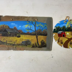 (2) E.C. Krebs stone wall decorations