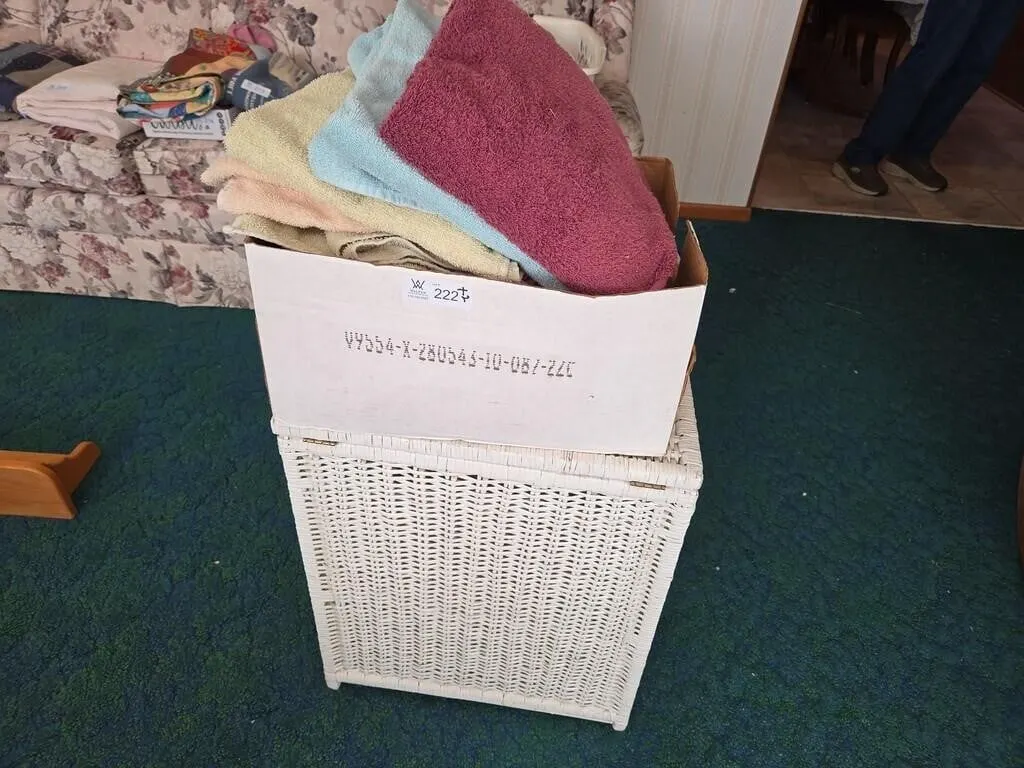 White Wicker Laundry Basket and Box of Bath Towels