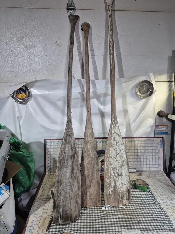 3 vintage canoe paddles, great man cave. Stuff.