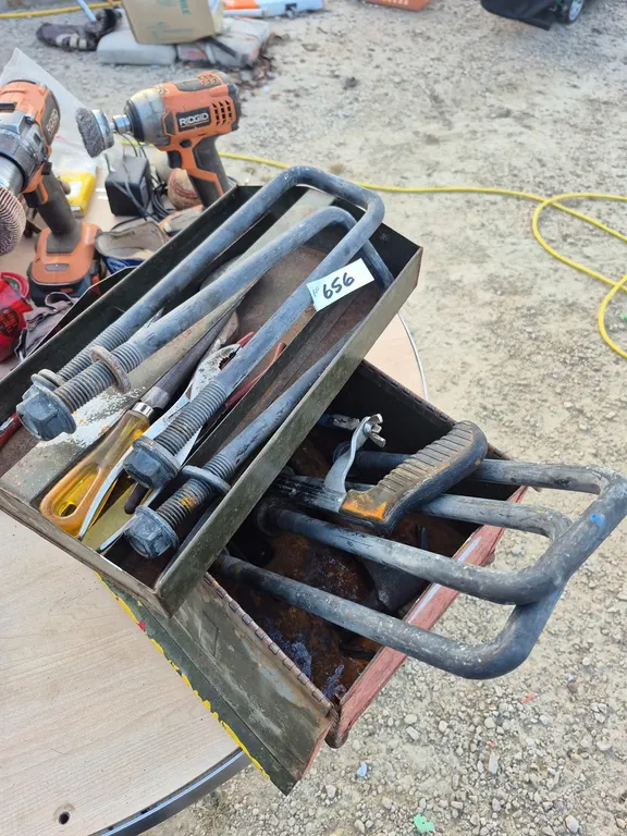 4 large U bolts with toolbox.