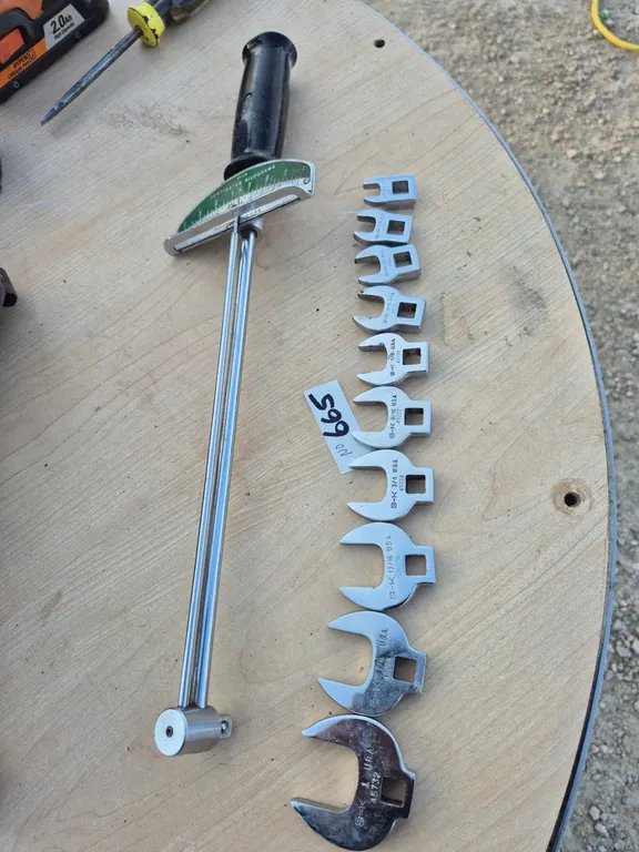 Crowfoot wrenches and torque wrench.