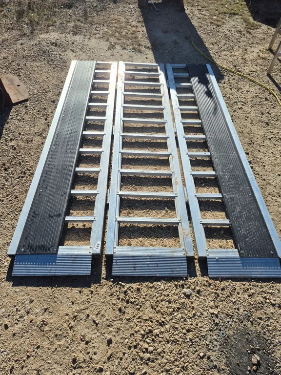Folding aluminum loading ramps.