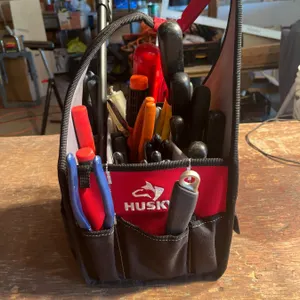 Husky Tool Bag With Screwdrivers, Pliers, Cutters, and Various Hand Tools