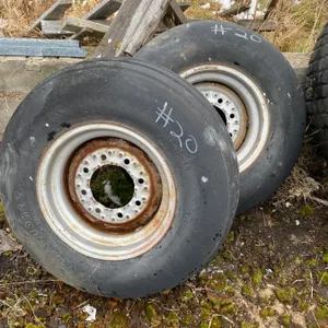 2- 12.5Lx16 tires & 8-hole rim, selling all together