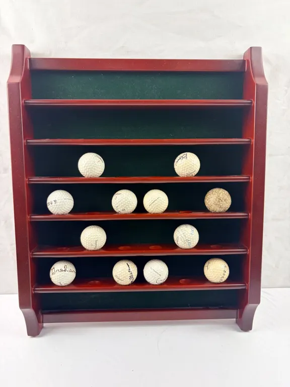 Collection of Golf Balls & Display Hanger