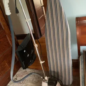 Ironing board and steamer