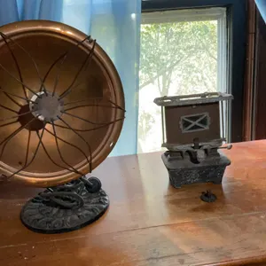 ￼ Two old heaters and an old doorbell