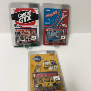 Three 1999 NASCAR 1:64 Die-Cast Cars in Original Packaging