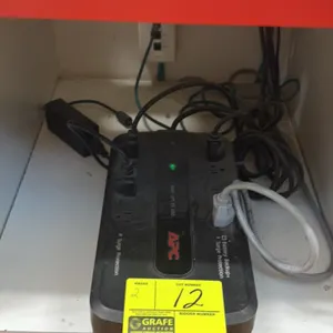 Assorted battery backup surge protectors. Includes APC Back-UPS ES 650 and Eaton 3S 750. Features battery backup and surge protection outlets. Electri