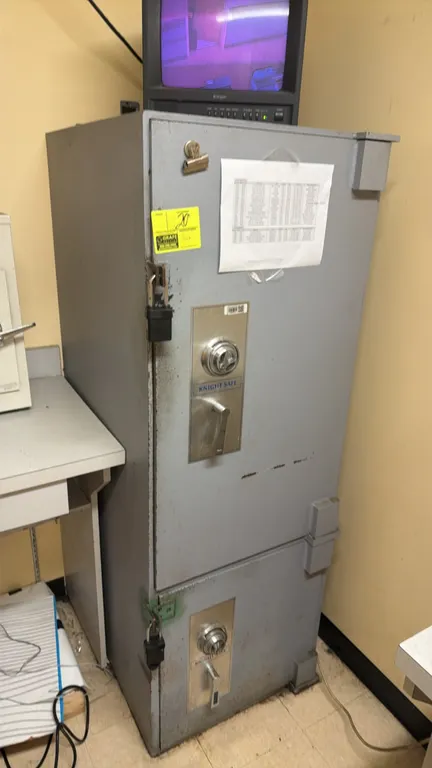 Knight Safe 2-door combination safe. Metal construction featuring dual compartments with mechanical combination dial locks and lever handles. Dimensio