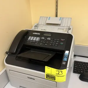 Brother IntelliFAX-2840 laser fax machine. Features Super G3 33.6 kbps transmission, integrated telephone handset, control panel with LCD display, and