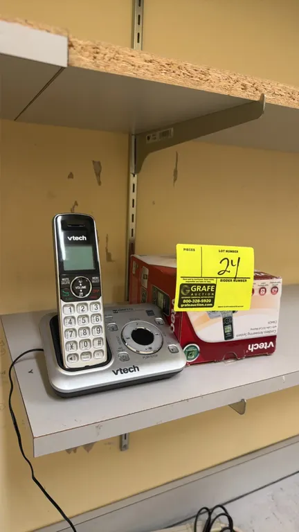 VTech CS6429 cordless phone system. Features cordless handset and base station with digital answering system, DECT 6.0 technology, caller ID/call wait