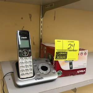 VTech CS6429 cordless phone system. Features cordless handset and base station with digital answering system, DECT 6.0 technology, caller ID/call wait