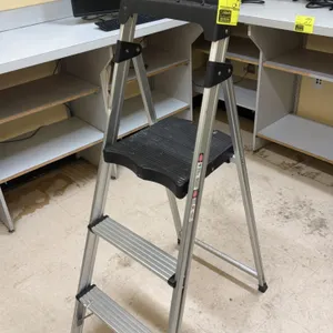 Aluminum folding step stool. Features a lightweight aluminum frame, two ribbed steps, a textured plastic standing platform, a top utility tool tray ha