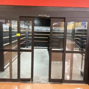 Walk-in beer cooler. Includes (3) Russell FL46-220E-E 4-fan ceiling evaporator coils. Features automatic sliding glass entry doors, (3) integrated dis