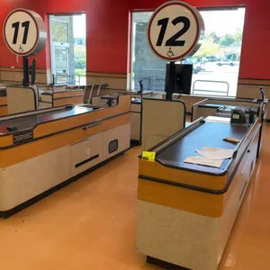 2008 Killion KCU1500 2-piece check lane counters. Features 6' and 2' motorized conveyor belts, lighted overhead lane number signs, cashier station, ba