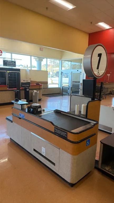 2008 Killion Industries KCU4500 grocery check lane. Features a 3' conveyor belt, scanner well, cashier workstation, bagging shelf, lower storage compa