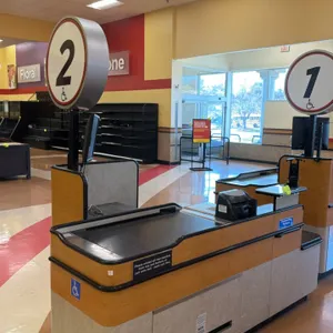 Killion KCU4500 grocery check lane counter. Features a 3' motorized conveyor belt, integrated scanner/scale well, cashier register stand, storage draw