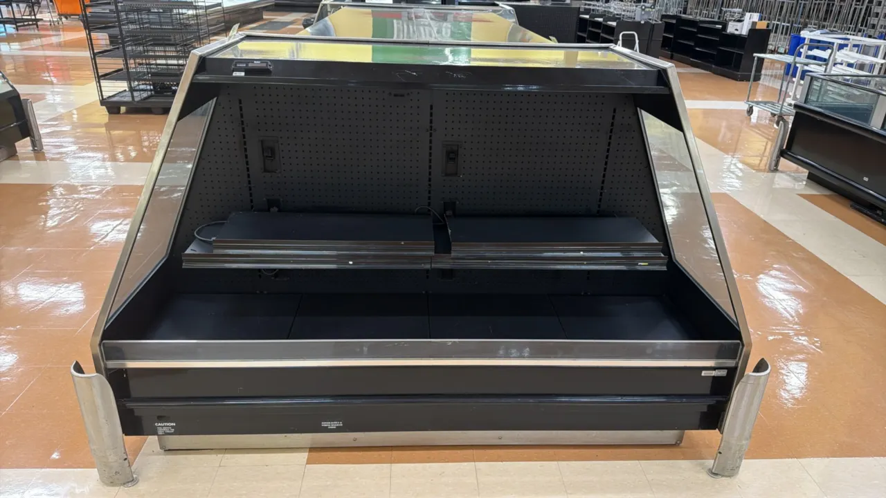 Barker 59PF6R remote low-profile open display cooler. Features glass side panels, top glass display, adjustable lighted shelving, and corner floor gua