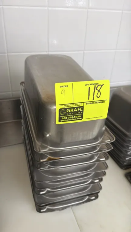 Stainless steel insert pans. Features stainless steel construction. 10"L x 6"W x 4"D.