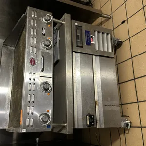 Wells gas griddle mounted on top of Arctic air Cooler