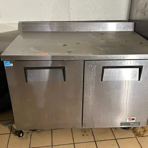 2 door True Freezer.  Bad Contents