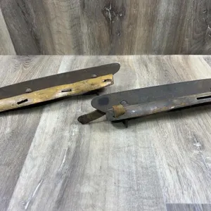 Carved Wood and Iron Ice Skates Pair