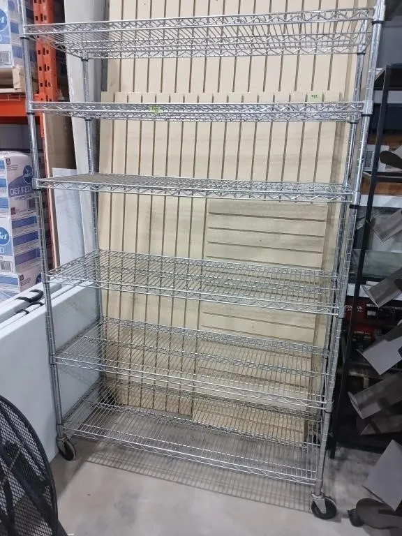Silver 6 tier wheeled metal shelf. 77"H x 48"L x