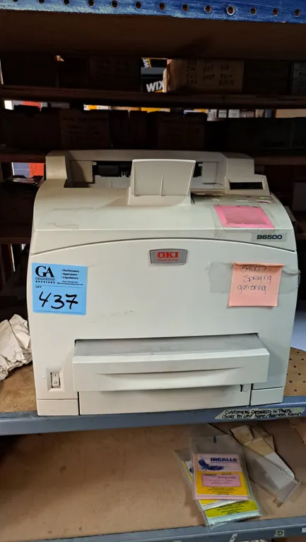 OKI Printing Solutions B6500 black-and-white laser printer with paper tray, automatic document feeder-style top paper handling, and digital control pa