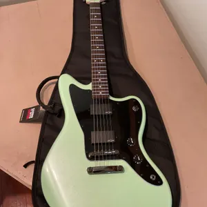Squier Jazzmaster Electric Guitar in Surf Green With Gator Case