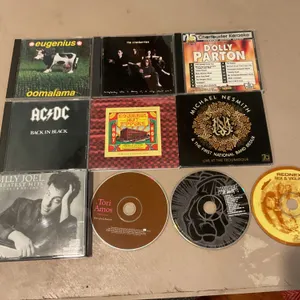 Nine Music CDs featuring Various Artists