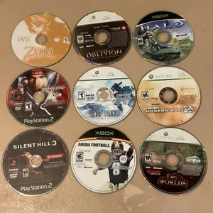 Nine Video Game Discs for Various Consoles