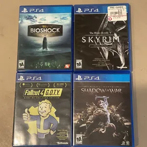 4 PS4 Video Games Including Bioshock, Skyrim, Fallout 4 GOTY, and Shadow of War
