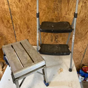 Two Folding Step Stools in Aluminum and Steel Construction