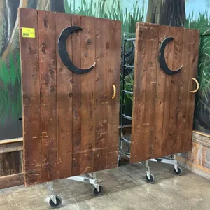 Wood and metal portable clothing racks. Features rustic wood plank front panels with decorative crescent moon accents, rope handles, and adjustable me