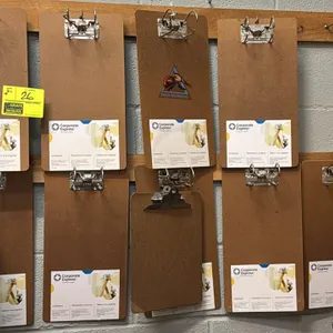 Corporate Express archboard. Features a steel arch clip mechanism that tilts back to load paper and holds up to 2" of two-hole punched forms. Hardboar