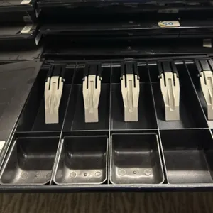 Cash drawer till inserts with locking covers. Features 5 bill compartments with clips, 5 coin compartments, and locking lids. Measures 15.5" x 12". No