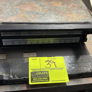 Master adjustable 3-hole punch. Features metal construction, wide lever handle, adjustable punch heads, and paper alignment guide.